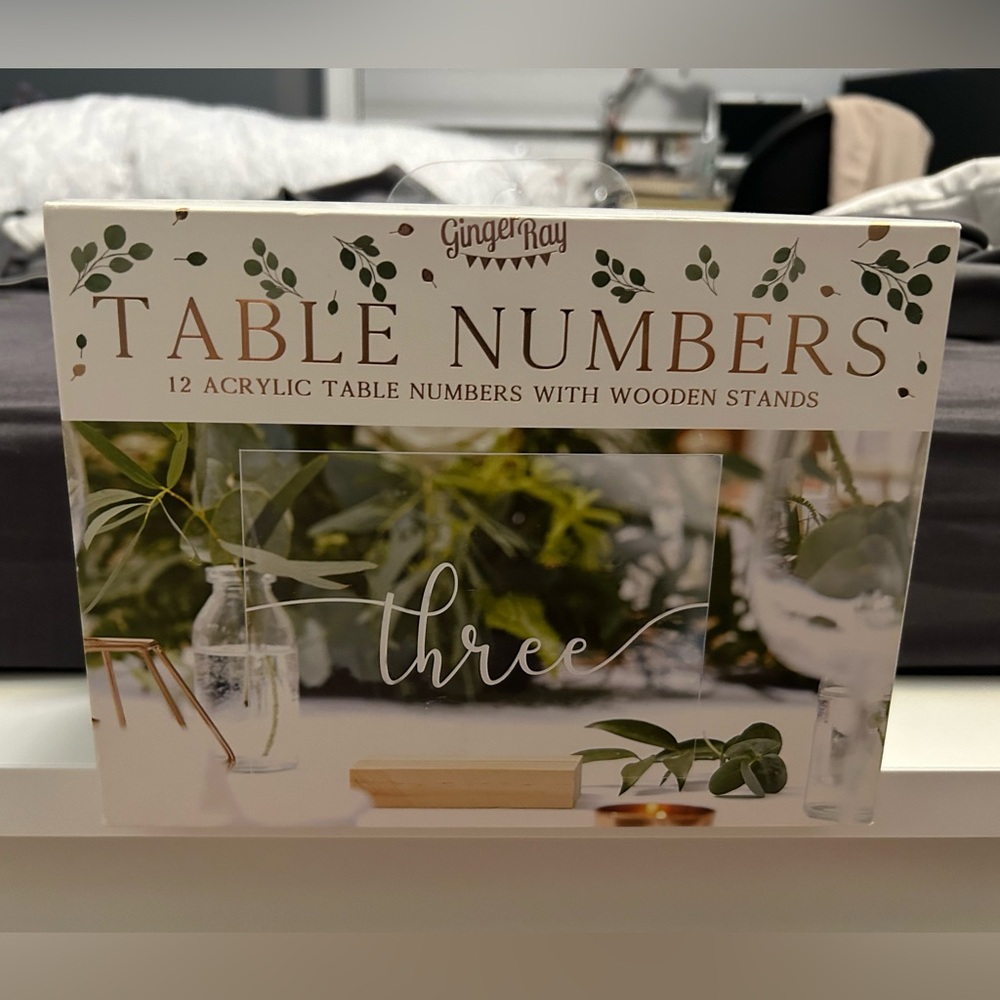 Acrylic table numbers with wooden stands